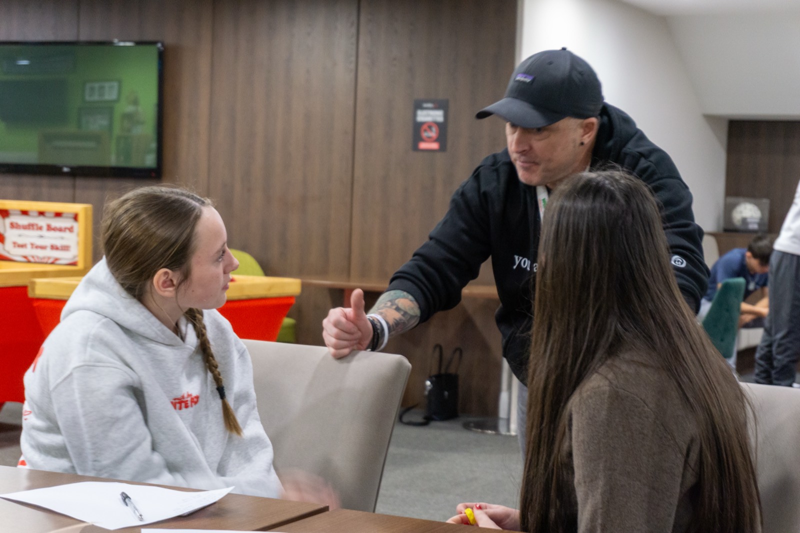 A mentoring conversation at a VFCC event
