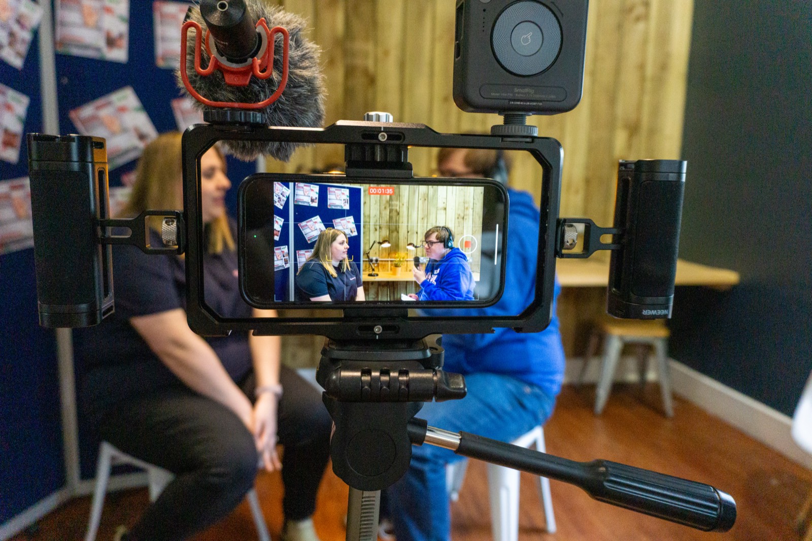 A young person being interviewed on camera at a VFCC event